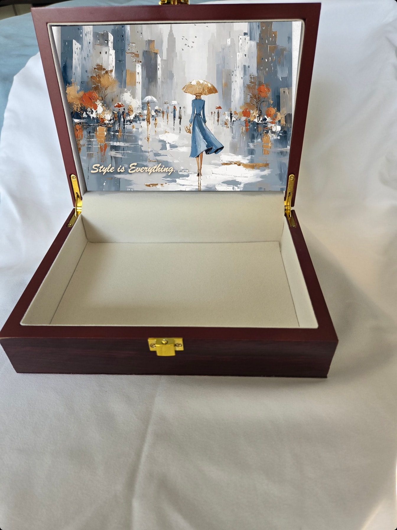 Wooden box with fashion illustration inside the lid